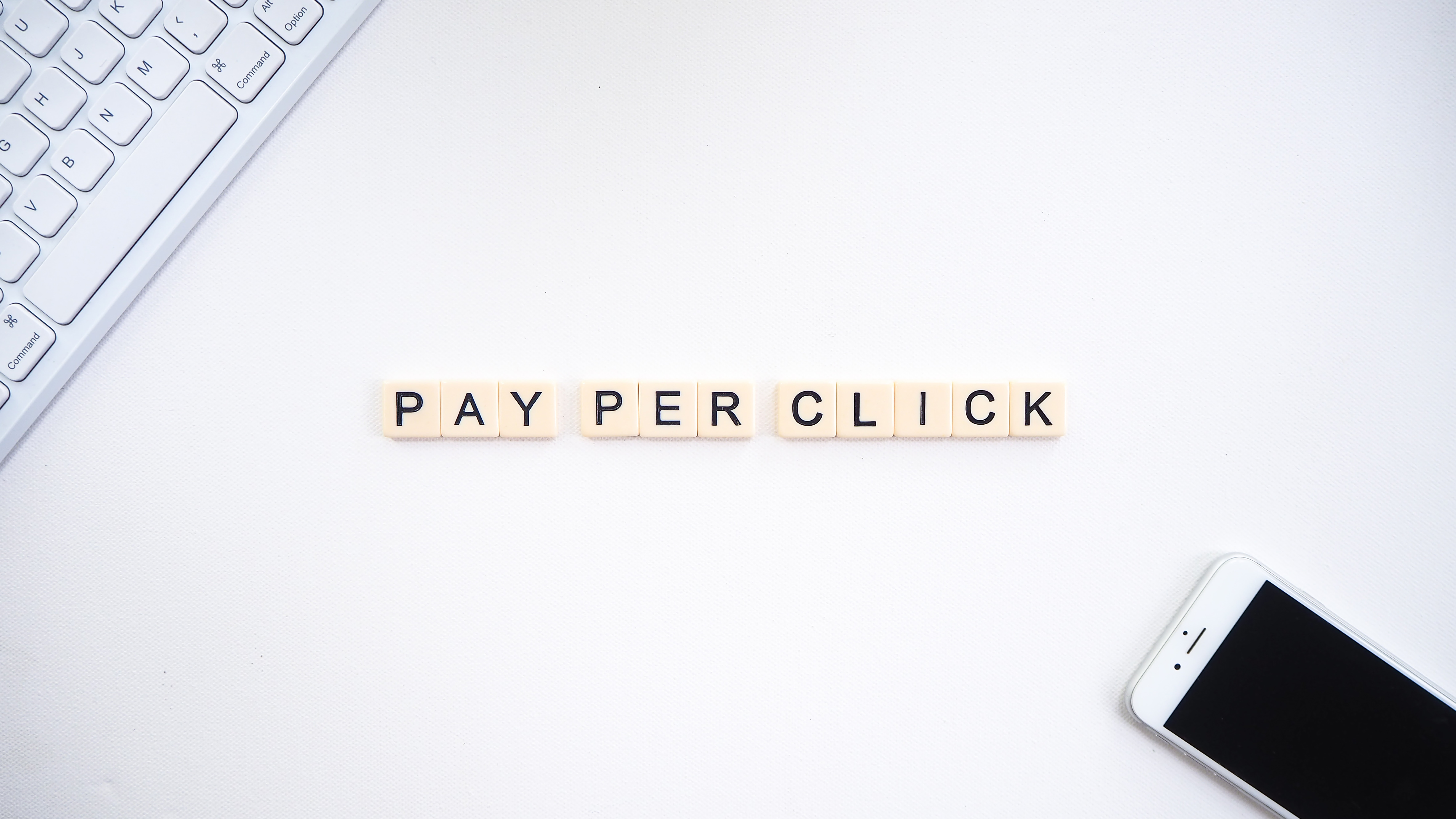 letter-tiles-spelling-out-the-words-pay-per-click-for-advertisements
